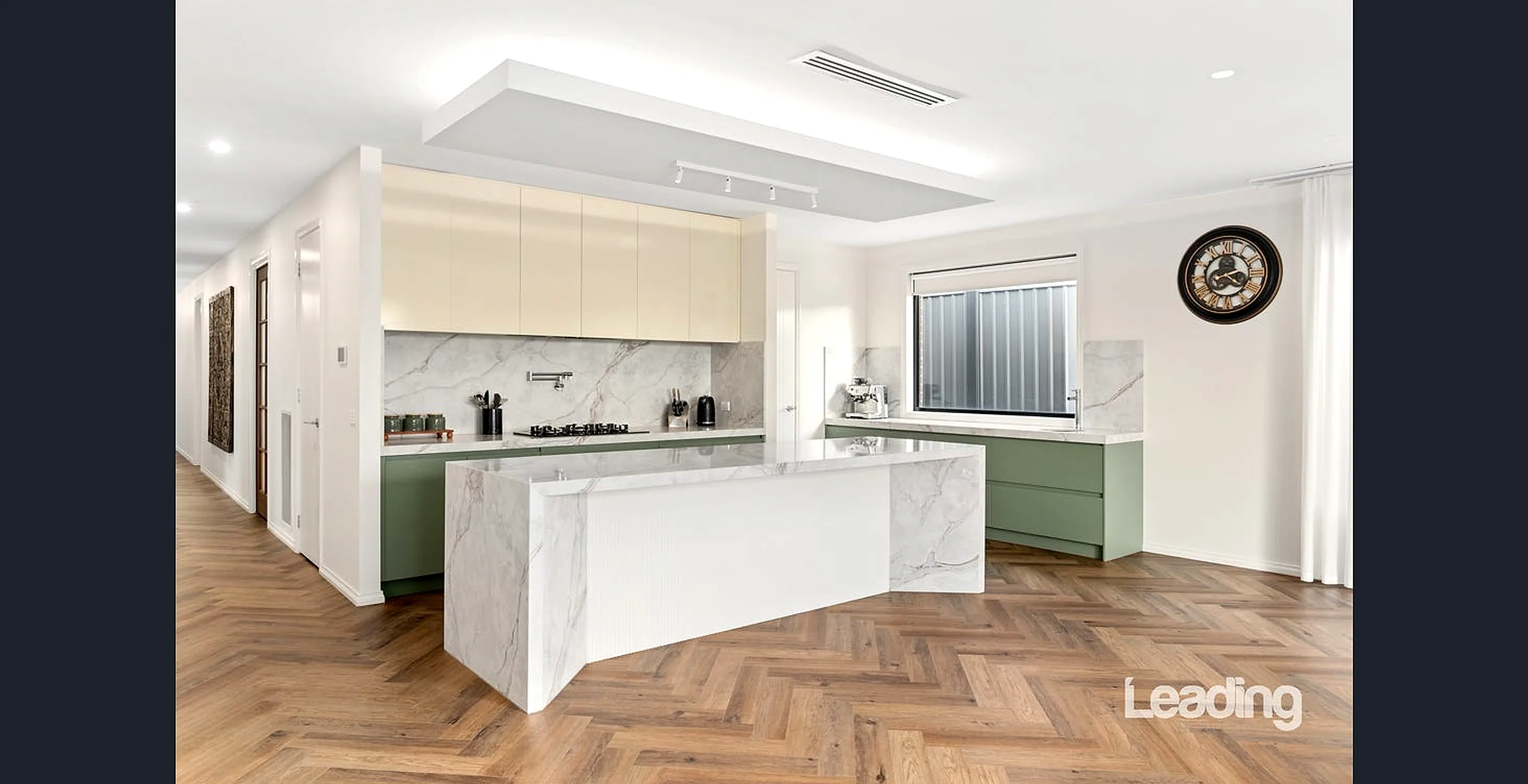 Designer kitchen with upgraded 60mm stone benchtops, oversized island and 900mm appliances