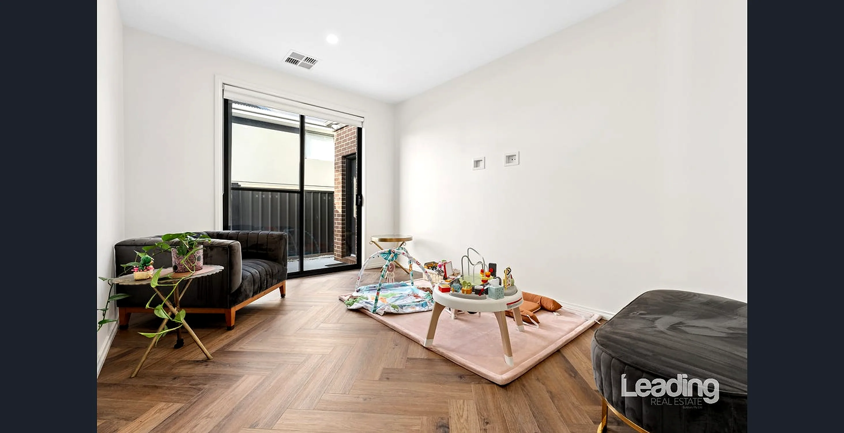 Dedicated theatre and rumpus room adjoining the garage at 122 Elizabeth Drive